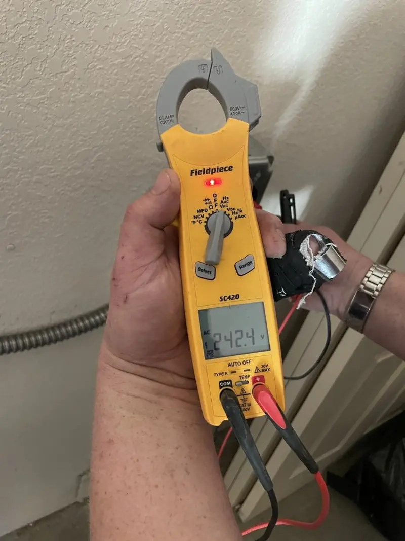 Voltage testing with clamp meter during Outlet Installation in Towamencin
